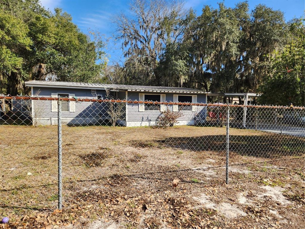 Photo of 2289 Cr 436a, Lake Panasoffkee, FL 33538 (MLS # OM717399)
