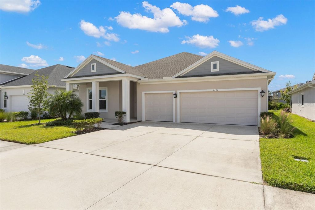 Photo of 31496 Westbury Estates Avenue, Wesley Chapel, FL 33545 (MLS # TB8433382)