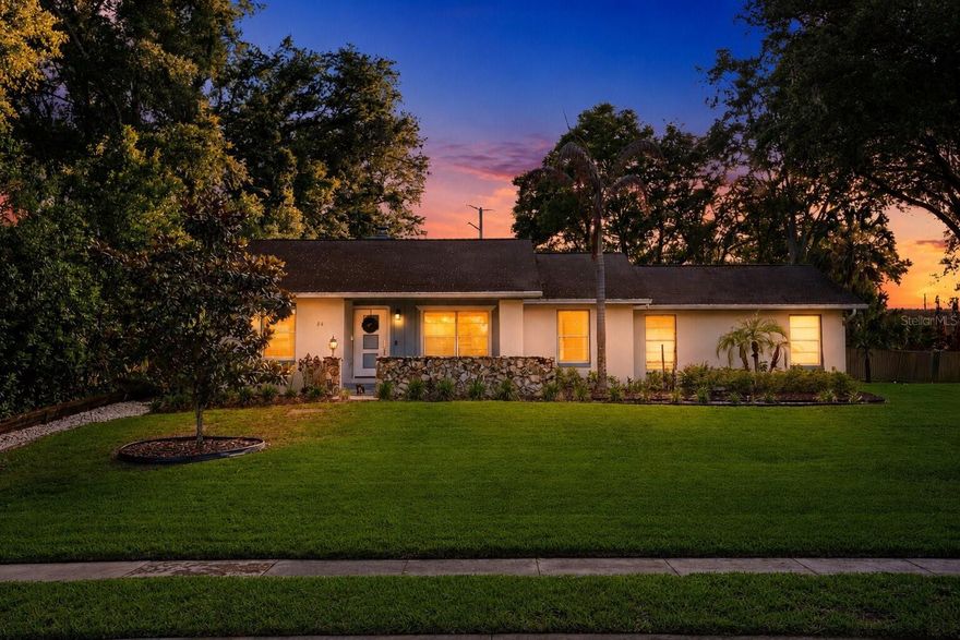 *New roof prior to closing*Nestled on a spacious 0.42-acre corner lot, this beautifully updated 3-bedroom, 2-bath pool home offers the perfect blend of comfort, style, and outdoor living. From the moment you enter, you’ll be welcomed by an open-concept layout designed for both everyday living and entertaining. The living room flows seamlessly into the dining area and kitchen, all accented by gorgeous porcelain wood-look tile flooring installed throughout the main living spaces in 2021. A stunning stone fireplace serves as the centerpiece of the home, adding warmth and character. The kitchen is thoughtfully designed with a large island, stainless steel appliances, and ample space for gathering with family and friends. The spacious primary suite provides a relaxing retreat, complete with an ensuite bathroom featuring a walk-in shower and soaking tub combination. All three bedrooms were updated with new vinyl flooring in 2025. Step outside to your oversized screened lanai featuring beautiful wood beam accents and an outdoor kitchen, creating the ultimate setting for entertaining year-round. The sparkling pool, extended patio, and oversized fenced backyard offer endless possibilities for relaxation, recreation, and hosting guests. Additional updates include a new water heater and electrical panel (2024), new pool skimmer, pool light (2023), new garbage disposal (2025), interior paint (2024), and fresh ceiling paint and popcorn removal (2022), new dishwasher (2023),. With its thoughtful upgrades, expansive outdoor space, and inviting layout, this home truly checks every box. Schedule a showing today and make this charming house your forever home!