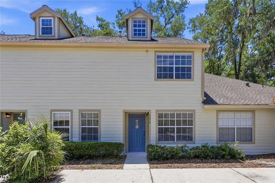 Come see this well-maintained 2 bedroom, 2.5 bathroom townhome in Haile Plantation Villas! This light and bright townhome features vaulted ceilings in the bedrooms and a spacious open floorplan. The kitchen has ample cabinet space, a large breakfast bar, and overlooks trees and peaceful greenspace. The large living room opens into the dining area and kitchen, which connects to a bonus room that you can keep open or close off with french doors. The HOA covers exterior maintenance, including roof, for low-maintenance living. Walking distance to the Haile Village Center and conveniently located near UF/Shands, HCA North Florida Hospital, Hawkstone Country Club, Veterans Memorial Park, shopping, and many restaurants. Contact us today to schedule a showing!
