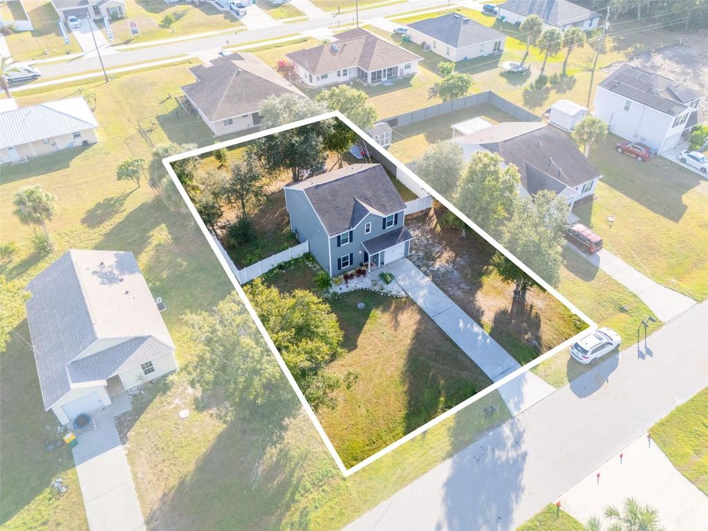 Photo of 22425 Esplanade Avenue, Port Charlotte, FL 33954 (MLS # C7517736)