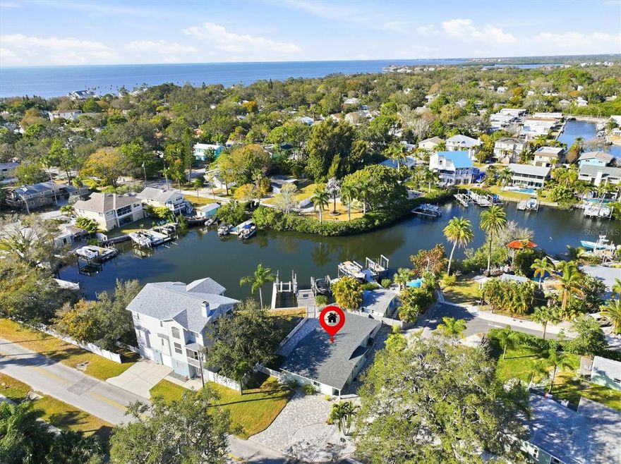 Deep-Water Gulf Access Oasis in Charming Crystal Beach – Your Blank Canvas for a Dream Waterfront Home!
Imagine living in a peaceful coastal oasis where vibrant sunset-painted skies greet you every evening. This classic Florida bungalow offers incredible potential on quiet Avery Bayou with direct Gulf access via Sutherland Bayou — no bridges to navigate and out at all tides.
Enjoy your private 10,000-pound boat lift and deep-water dock. Perfect for the true Florida boating and fishing lifestyle you’ve been dreaming of.
The home experienced flooding during Hurricane Helene, but water damage was fully remediated right afterward. It now stands as a true blank canvas — a rare opportunity to remodel and create your custom dream home while staying within the FEMA 50% Rule . Offered strictly as-is, this project is ideal for the savvy buyer or investor ready to personalize every detail and maximize value in this highly desirable waterfront location.
Some of the Property Highlights include: lots of beautiful cosmetic updates in 2017/2018, new roof in 2018. all new PGT windows and doors in 2019 and the dock was completely redone in 2017 including installing the new lift.  
No HOA, golf-cart friendly. bike to the nearby Pinellas Trail, visit the Crystal Beach fishing pier just blocks away, or hop on your golf cart for stunning direct waterfront sunsets. 
Fantastic proximity to downtown Palm Harbor, Ozona, Dunedin, Tarpon Springs, the Dunedin Causeway, Honeymoon, Island — with local restaurants nearby and that laid-back coastal vibe.
Every day can feel like a vacation when you live on the water. This is a unique chance to own affordable deep-water frontage in Crystal Beach with endless upside and so much old Florida charm. Don’t miss out — schedule your showing today!