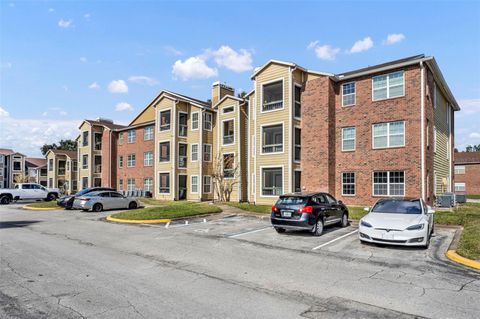 Photo of 5600 Devonbriar Way #N203, Orlando, FL 32822 (MLS # O6404004)