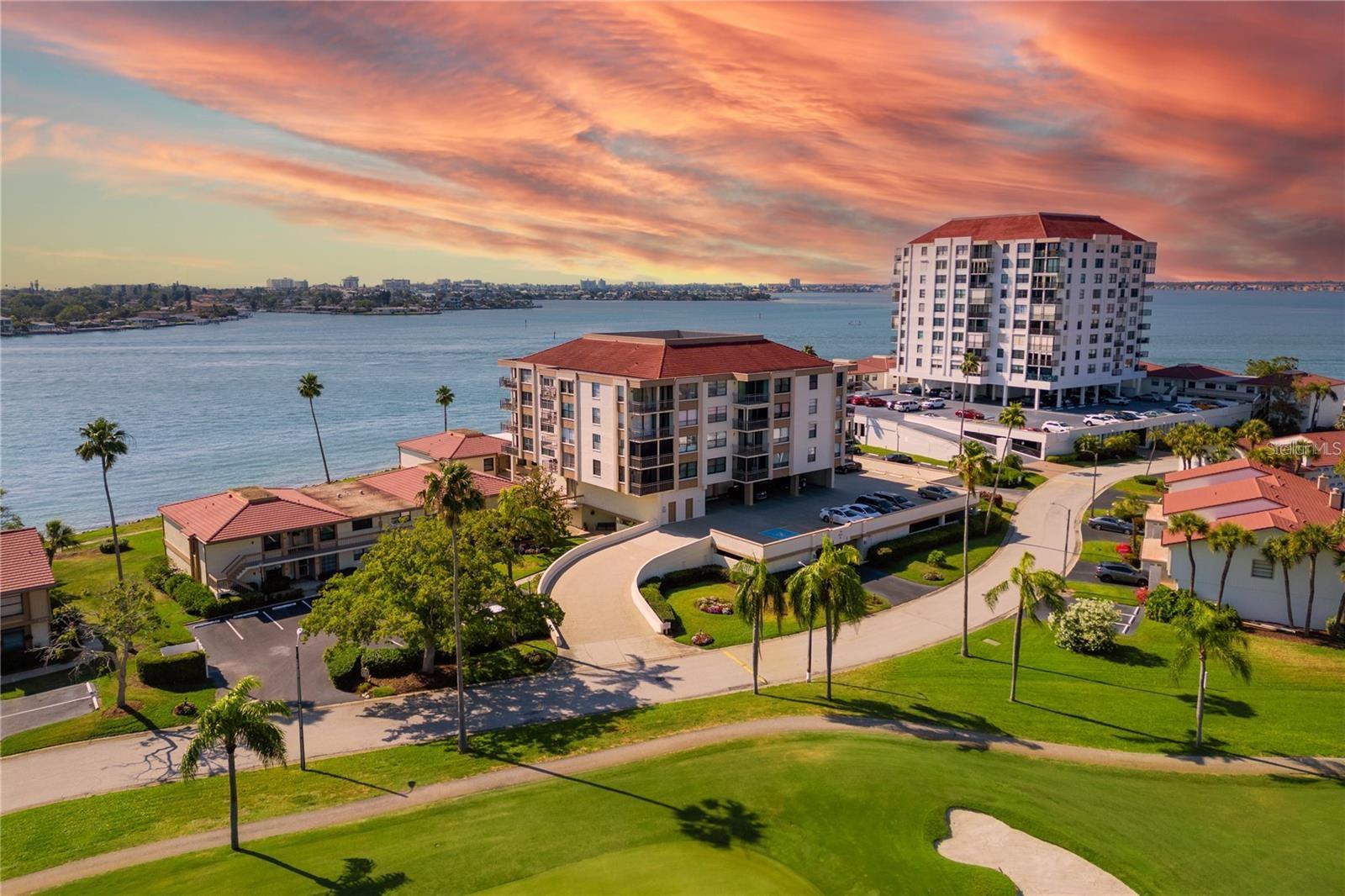 This waterfront penthouse condo is absolutely exquisite! The iconic views of the Don CeSar are breathtaking. The popular Seville floor plan provides panoramic views. Both bedrooms offer water views, making every corner of the condo a delight to behold. The master bedroom, with its walk-in closet and updated ensuite bathroom, offers a luxurious retreat. The guest bedroom even boasts fabulous views of Boca Ciega Bay and a remodeled guest bathroom. Updated flooring throughout add to the modern appeal of the space. Storm shutters on the balcony and updated windows. Covered parking space #116 and additional storage locker is incredibly convenient. The community amenities, such as the waterfront pool and recreation room are perfect for relaxation and entertainment. Desirable Casa Del Mar community provides easy access to the Isla Del Sol Yacht and Country Club and a variety of membership options which adds another layer of luxury and leisure possibilities (fees apply). With its proximity to Gulf beaches, Ft. Desoto Park, shopping, restaurants, and Interstate 275, this condo offers both tranquility and convenience in a prime location. A dream living space for anyone looking for a combination of elegance, comfort, and leisure opportunities.
