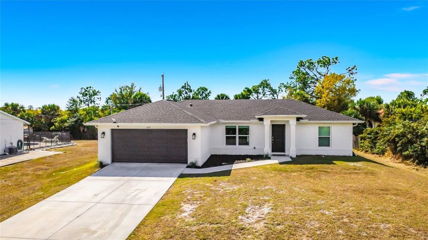 Step into effortless Florida living with this stunning, move-in ready newer (2023) construction home featuring a sparkling POOL and an expansive tiled deck perfect for entertaining. Connected to city water and thoughtfully designed throughout, the interior showcases wood-look tile flooring, elegant quartz countertops, soft-close all-wood cabinetry, tray ceilings, and sleek stainless steel appliances. The spacious open floor plan creates a seamless flow for everyday living, while the primary suite offers double vanities for added comfort and convenience. Hurricane-impact windows and sliding glass doors provide peace of mind and energy efficiency. Nestled on a charming, quiet street just minutes from shopping, dining, parks, beaches, schools and all necessities of life! This property is outside of a flood zone and comes with the added benefit of no HOA fees and no CDD. Stylish, secure, and superbly located — this is the home you’ve been waiting for.