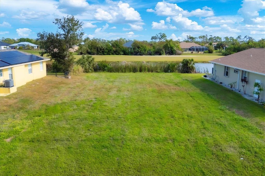 Photo of 244 Tournament Road, Rotonda West, FL 33947 (MLS # D6139533)