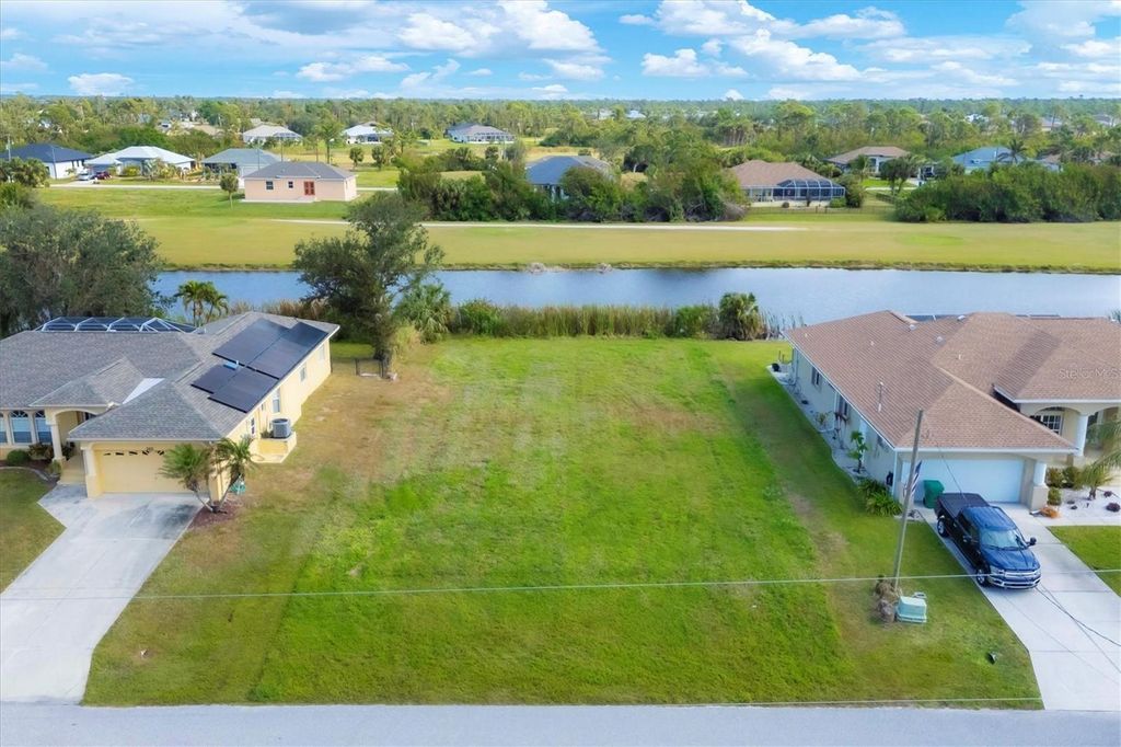 Photo of 244 Tournament Road, Rotonda West, FL 33947 (MLS # D6139533)