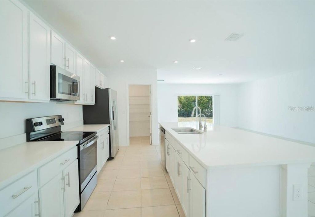 Photo of 280 Citrine Loop, Kissimmee, FL 34758 (MLS # S5141429)