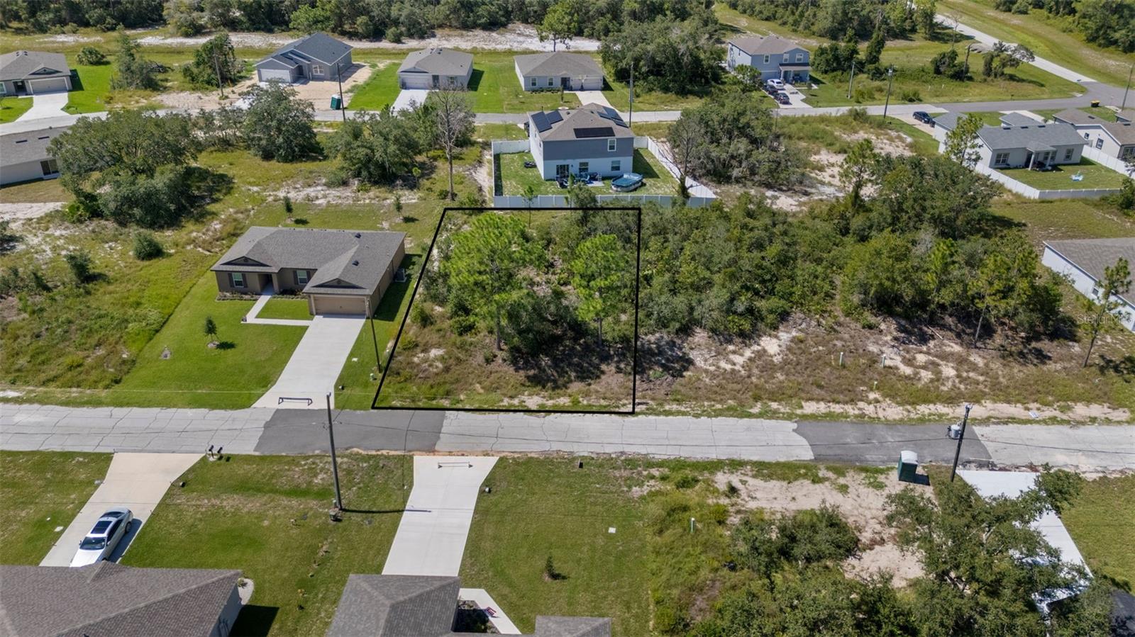 The seller owns 12 lots in Poinciana, several on the same street, which can be PURCHASED IN BULK, presenting a rare opportunity for builders or investors to secure multiple parcels at once at a discounted rate. MLS Numbers: O6335500, O6335685, O6335689, O6335698, O6335703, O6335706, O6335716, O6335719, O6335726, O6335730, O6335755. This lot at 412 Caribbean is ready for your next project. With utilities recently added to this street, it has seen a boom in new home construction over the last year.
The low HOA fee includes access to the Poinciana Victory Pool, Aquatic Center with 8 lap lanes, and the APV Community Center featuring event rooms, an amphitheater, a fitness center, and expansive outdoor recreation with sports fields, basketball courts, playgrounds, picnic areas, and walking trails. High-speed internet (300 Mbps) and cable TV (250+ channels) are also included.
The lot is conveniently located near shopping centers and restaurants. It’s a short drive to Disney, SeaWorld, Universal Studios, Legoland, and Orlando International Airport, offering both lifestyle and convenience.
This lot is perfect for new construction or long-term investment. With low HOA fees, abundant amenities, and strong area growth, these Poinciana lots provide unmatched opportunity for builders, investors, or future homeowners.
