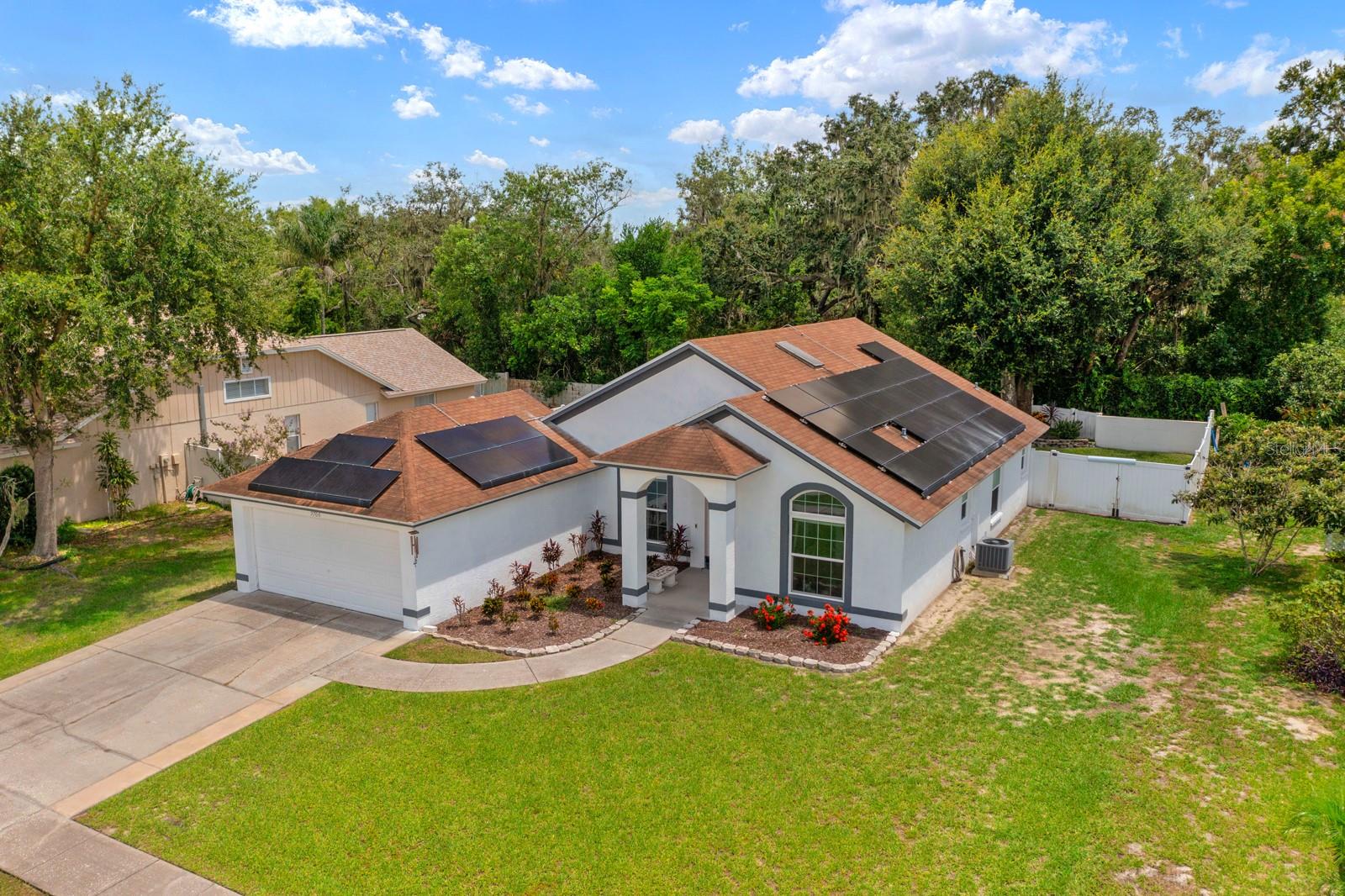 Fully Renovated Riverglen Beauty with Climate Controlled Private Workshop, Solar Power & No Backyard Neighbors!
Welcome to this exceptional home in the highly desirable community of Riverglen—a rare find that blends stylish interior updates, energy efficiency, and functional extras, all on a private 80 x 125 ft oversized lot with no backyard neighbors.
This 1,571 sq ft, 3-bedroom, 2-bath residence has undergone comprehensive updating, offering turnkey living at its finest. From the freshly painted exterior to the tile flooring throughout, every detail has been thoughtfully upgraded. The new kitchen features quartz counters, soft close drawers and cabinets and several lazy susan's to maximize space and flows seamlessly into the open-concept living and dining areas, all enhanced by soaring ceilings and a warm, neutral color palette.
The primary suite offers a tranquil retreat with a large walk-in closet, a spacious en suite bath featuring a garden tub, dual vanities, and a separate walk-in shower. Two additional bedrooms share a full bath, making this home ideal for families or guests.
Energy efficiency is top of mind with new hurricane-rated windows and doors, whole-house solar panels with battery storage. During peak months you may get a check back from the electric company! Light floods the home through upgraded windows, and newer fans and fixtures add a modern touch.
Outdoor living is a breeze thanks to the epoxy-coated, screened-in back patio, perfect for morning coffee or evening relaxation. But the showstopper? A huge workshop space on the backside of the garage, fully equipped with its own mini-split AC system—ideal for a home business, hobbyist, gym, or extra storage.
This is more than a home—it’s a lifestyle upgrade. Nestled in a prime location, with quick access to shops, dining, and top-rated schools.
