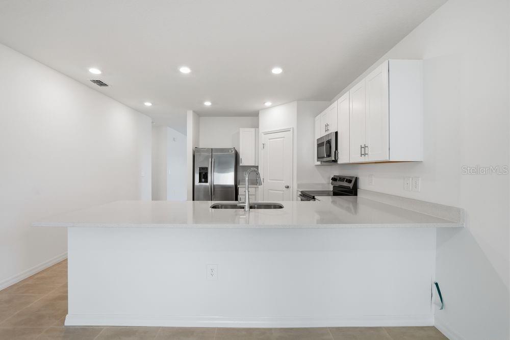 13602 TROPICAL BREEZE WAY