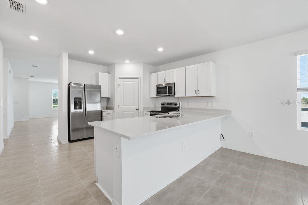 13602 TROPICAL BREEZE WAY