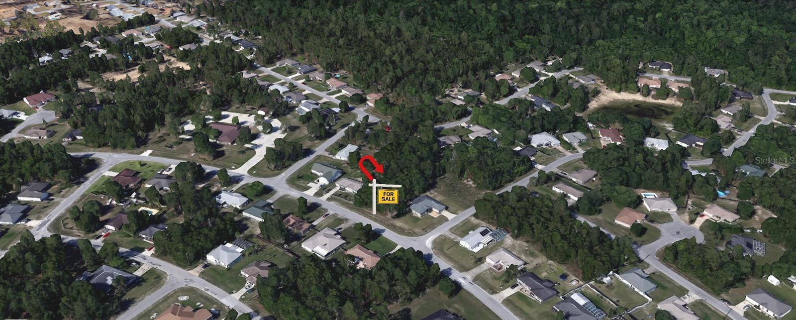 Oversized lot available in Ocala’s Silver Springs Shores – Unit 20. Unlock the potential of over a quarter-acre nestled in one of Marion County’s most desirable areas. This oversized lot, zoned R-1 for single-family dwellings, offers approximately 75 feet of frontage, 142 feet of depth, and 87 feet of rear yard, providing generous space for an ideal home with an expansive backyard that could include a pool, garden, workshop, or shed. With no HOA or CDD fees, you’ll enjoy freedom and flexibility without added costs. Plus, you’ll have peace of mind knowing the property is located in a no-flood zone. Less than 2 miles away are Lake Diamond Golf & Country Club and Ocala Greenway Disc Golf Course. Nature lovers will adore the proximity to Marjorie Harris Carr Cross Florida Greenway Park and Baseline Trailhead Park, offering miles of scenic trails for hiking, biking, horseback riding, and serene walks. This homesite is conveniently located near vibrant downtown Ocala with its restaurants, retail shops, and amenities, while still granting easy access to the tranquility of the Ocala National Forest and Florida State Road 40. From here, drive straight to either the Atlantic Ocean or the Gulf Coast, embracing all the best Florida has to provide. Design your dream home—minutes from nature, moments from town. GPS Coordinates: 29°08'30.4"N 82°01'33.6"W