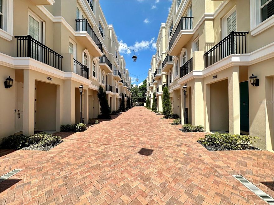 Pending - Accepting Backup Offers. Location, luxury interiors and rooftop paradise!!! Welcome home to this luxury townhome in the heart of the most walkable city in Florida, Saint Petersburg. Located just a block and a half from vibrant Beach Drive, this home is located within the gated Regent Lane community and is within a very short distance to over 70 restaurants, shopping, the marina, museums, 6-parks, a 26-acre Pier, and so much more. This home features 5 levels and offers 3 floors of spacious living, as well as a large two-car tandem garage on the 1st level and your own private rooftop terrace on the 5th level. Navigate the first 4 levels with ease with your own private residential elevator. The 2nd level encompasses your beautiful kitchen, living and dining space. Entertain for family and friends with the open-concept floor plan, stainless steel appliances with an induction range, soft close wood cabinetry, and a stunning 10' granite island. The Primary Suite covers the entire 3rd level and includes a spacious walk-in custom closet and private office. The 4th level has 2 ensuite bedrooms, both with walk-in closets, and a discreet laundry room in the hallway that includes a sink and storage space. As you head up to the rooftop you will be met with a custom dry bar and fridge to entertain as you gaze out towards the historic Vinoy, the St Pete Pier, the beautiful city lights or the stars above. You also have access to electric, water and cable hookups, plus natural gas for your grilling needs. From your rooftop you can catch the morning sunrise directly over Tampa Bay, the magical sunsets over the award winning beaches, or enjoy the stars in the sky from your own private retreat. Additionally, this home has TONS of storage space and was designed with functionality and ease in mind. With a low HOA fee located in a perfectly planned and placed "Live, Work, Play" community, this home is awaiting YOU!