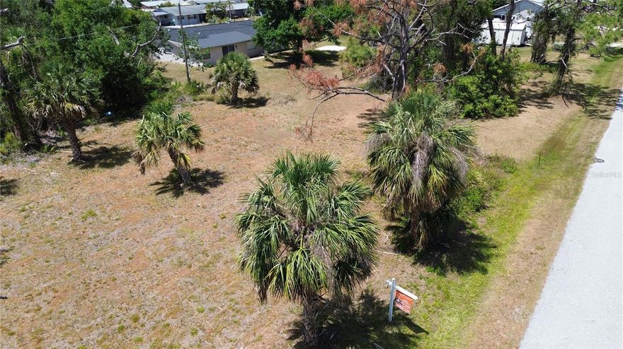 3 side-by-side residential lots in a wooded neighborhood just minutes from everything Englewood has. These parcels total nearly ½ an acre and are situated in X FLOOD ZONE, a big bonus for future homeowners! PUBLIC WATER & PUBLIC SEWER! Park your boat next to your home and be at anyone of the multiple boat ramps. RV parking is acceptable next to your home, no need to pay storage fees here. 

Enjoy the privacy of a natural setting with county-owned land directly across the street, creating a tranquil, park-like view and added space between neighbors. Yet you're just a short drive to everything you need:

Under 6 miles to Englewood Beach – sun, sand, and turquoise water await!

Only 7 miles to Boca Grande Causeway – explore island life, world-class fishing, and charming shops.

Less than 5 miles to shopping, dining, grocery stores, and everyday conveniences.

Whether you're ready to build now or planning for the future, this trio of lots offers flexibility, value, and location, location, location. Imagine your custom home nestled in a quiet community—morning coffee with the sound of birds, afternoons at the beach, and evenings under swaying palms.

No HOA. No flood zone worries. Just a smart investment in the Florida lifestyle.

Ready to turn your vision into reality? Let’s talk about making these lots yours today!