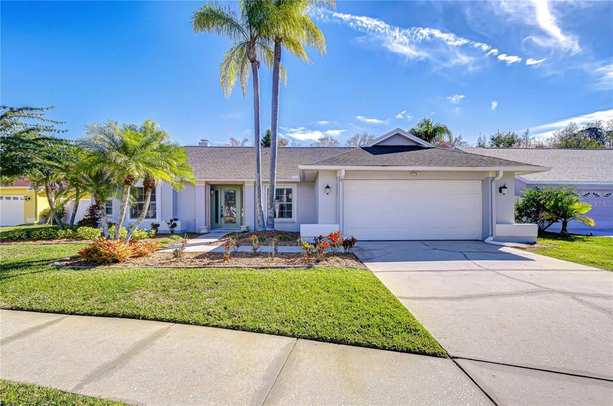 Set on a serene conservation lot, this beautifully maintained pool home offers rare privacy, peaceful views, and a true connection to nature. Enjoy mornings watching deer and local wildlife from your own backyard while still being close to everything Tampa has to offer. Inside, a bright and open floor plan features tile and bamboo flooring and flows seamlessly to the screened pool and expansive outdoor living area. The covered lanai creates the perfect space for entertaining or relaxing year-round. The saltwater pool includes solar heating and Nebula lighting, creating the ideal setting for both daytime enjoyment and evening ambiance. The kitchen and bathrooms have been tastefully upgraded, complemented by an upgraded Culligan water filtration system in the kitchen for enhanced everyday living. Major system updates provide peace of mind, including a replaced electrical panel, a newer A/C unit, hurricane-rated windows and shutters, and a 7,000 kW generator. Just off the entry foyer, the formal dining room sits opposite a dedicated office, ideal for working from home or flexible use. The kitchen opens to a spacious family room featuring a fireplace, built-in cabinetry, and shelving, while the adjacent breakfast nook overlooks the pool, lanai, and tranquil conservation views. The owner’s suite offers a large walk-in closet and a well-appointed bath with dual vanities, a makeup station, separate shower, and jetted tub, complete with Bluetooth speaker and night lighting. Three additional bedrooms provide generous space and ample storage. Recent exterior improvements include new fencing and upgraded walkways, enhancing both curb appeal and functionality. Additional features include a Kitchen reverse osmosis system for filtered drinking water and ice, a water softener, and attic storage with stair access from the garage. A new washer and dryer are also included. Located in the desirable Countryway Golf Community, this home is close to top-rated schools, parks, shopping, and dining, just 15 minutes from Tampa International Airport and approximately 30 minutes to award-winning Gulf beaches.