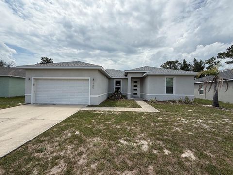 Photo of 105 Zinnia Lane W, Kissimmee, FL 34759 (MLS # O6416054)