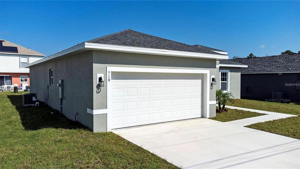 Photo of 719 Martin Lane, Poinciana, FL 34759 (MLS # S5140322)