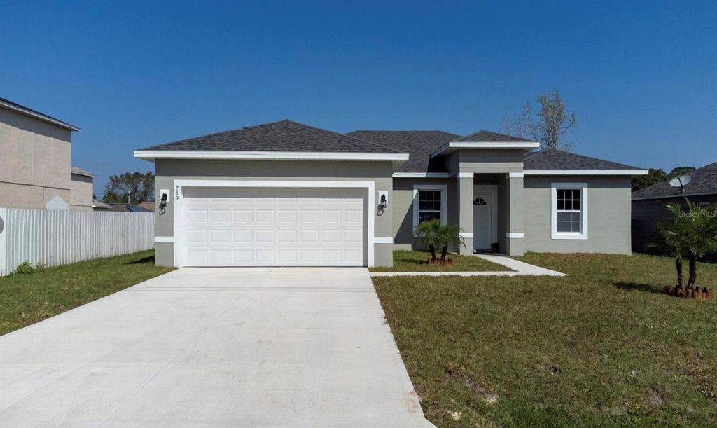 Photo of 719 Martin Lane, Poinciana, FL 34759 (MLS # S5140322)