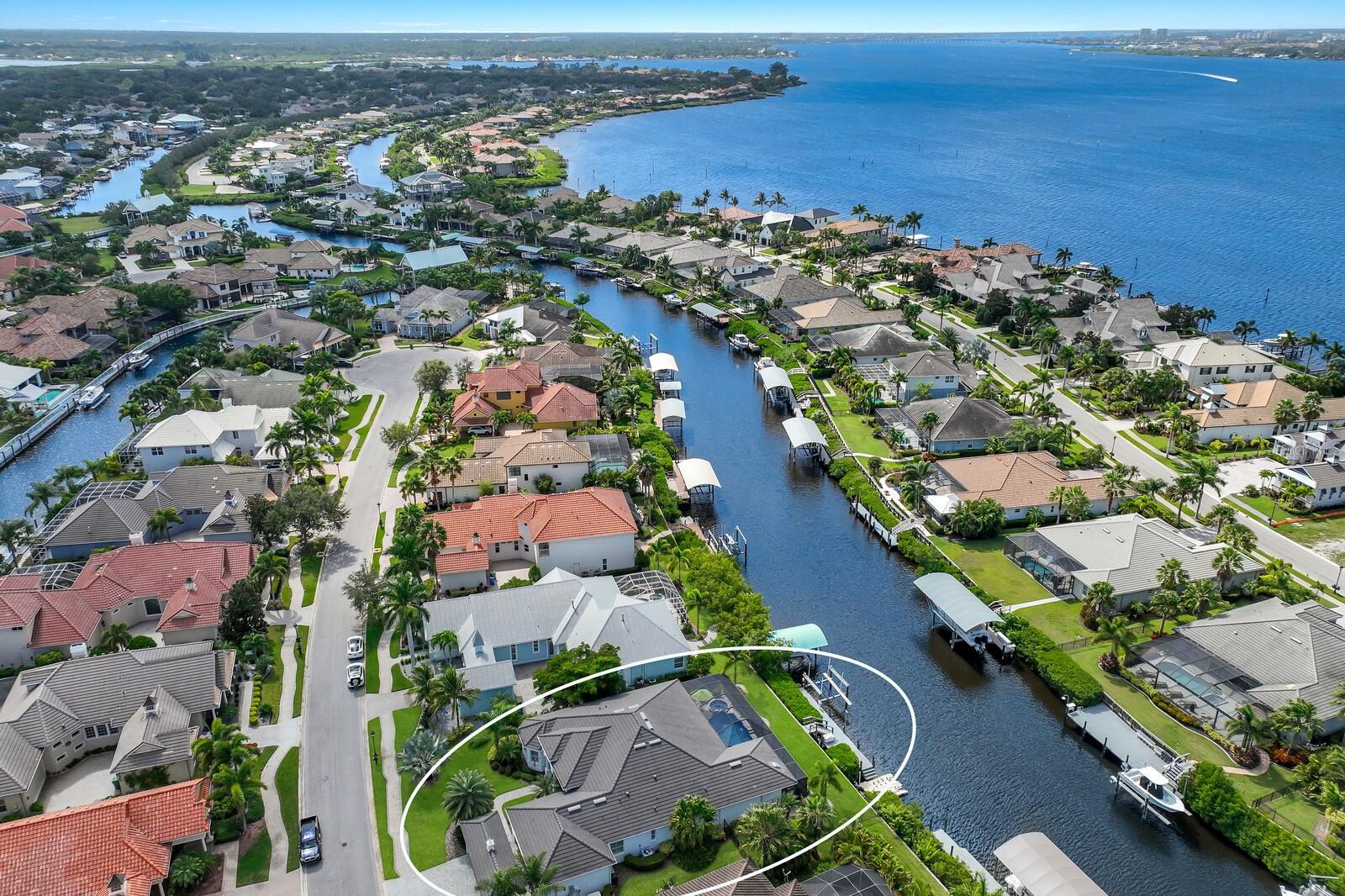 Prepare to be impressed by this award-winning custom-built waterfront estate. With over $480k in additional upgrades, including a whole-house generator, this home has all of the bells and whistles. This home has everything a buyer is looking for and more –on a SALTWATER CANAL with DIRECT ACCESS to the Gulf of Mexico and beyond. Sitting on an oversized lot, this oversized Santa Maria floorplan has a 53’ boat dock and jet ski dock right in the backyard on an approx. 120ft-wide saltwater canal – no lifts/lockes to go through! Custom features include the entire floorplan was widened by 4 feet across the front and 10 feet in the back, air-conditioned garage w/extra storage, built-in bar in bonus room, outdoor kitchen, commercial alarm system, high-tech sound system, water softener & pressure booster, upgraded lighting fixtures/fans/toilets, expanded dock w/14,000 pound boat lift & floating jet ski docks, new sod on yard, fenced yard, new screens on pool cage, new travertine on pool lanai, newly refinished pool w/Pebble Tech, new landscape lighting, rain gutters, whole house generator, hurricane shutters, and more (list attached). This 4bed 3bath open floorplan home is located in the gated boating community of Harbour Walk with close access to I-75 and all of the conveniences of shopping, dining, beaches, and 3 major airports. Take advantage of buying a home that has had all the upgrades already done & live the Florida Lifestyle in a GATED boating community! Low HOA fees and no CDD fees.