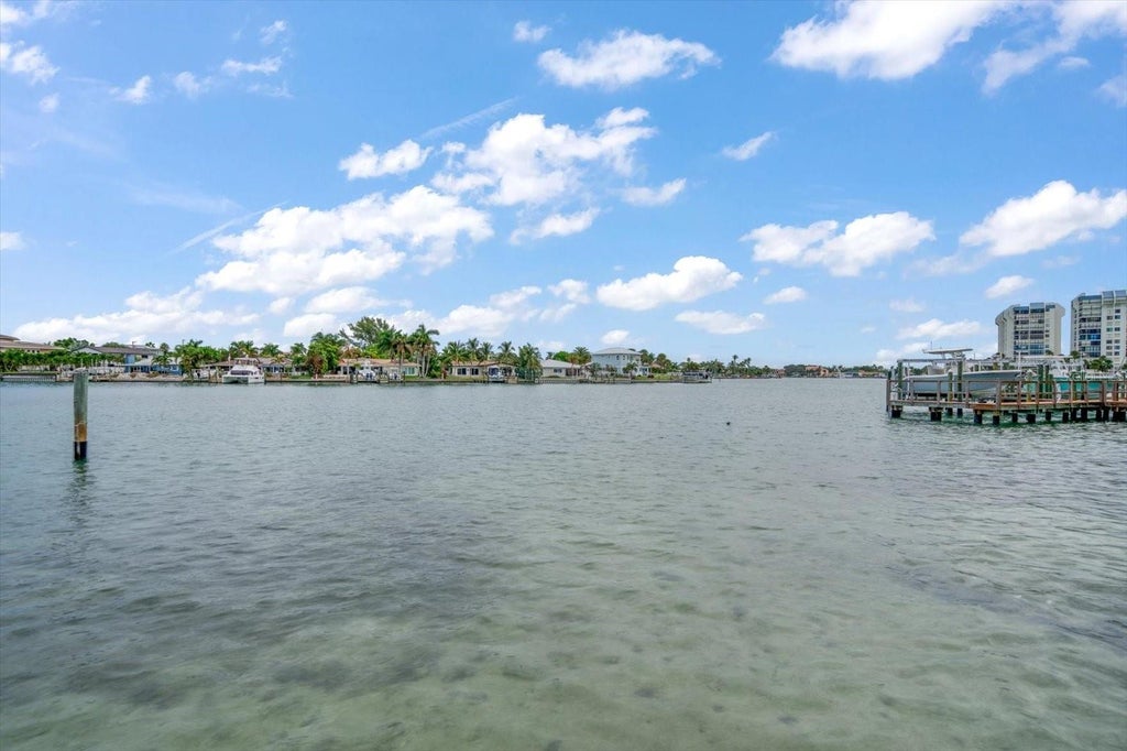 Photo of 115 99th Avenue, Treasure Island, FL 33706 (MLS # TB8553708)