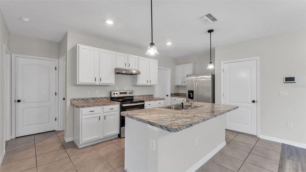 Photo of 225 Gina Lane, Davenport, FL 33837 (MLS # L4960164)