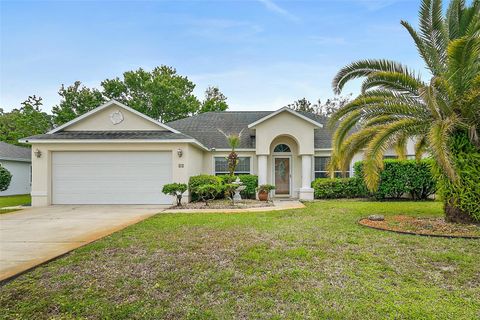 Photo of 22 Egret Trail, Palm Coast, FL 32164 (MLS # FC317726)