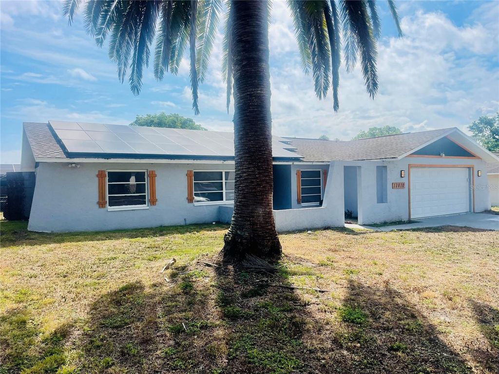 Photo of 11010 Salt Tree Drive, Port Richey, FL 34668 (MLS # TB8479233)