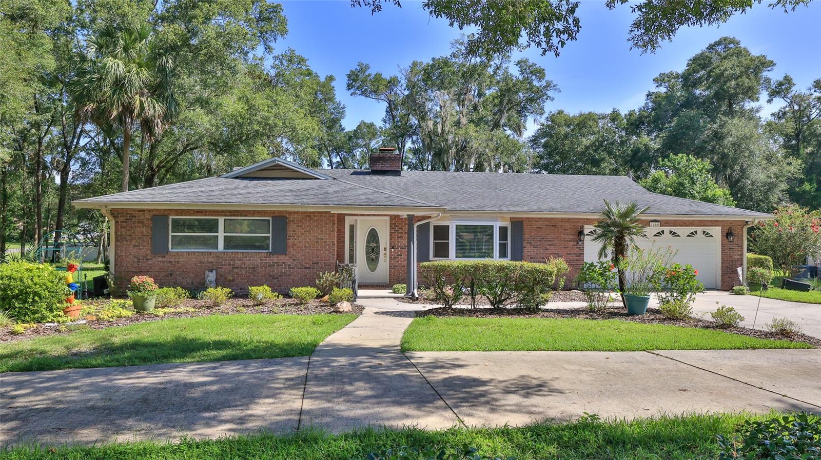 This lovely well-maintained home is located in Glenwood on over a half acre and is move-in ready It boasts a formal living room, dining room, family room, a kitchen with a breakfast nook that overlooks an inviting pool on these very hot summer days, and a bonus room that could be an office, den or playroom. The kitchen includes granite counter tops, newer oven with microware, stove top and dishwasher The home also offers an indoor laundry, ceiling fans, newer flooring in the bedrooms, a security system and security and safety window film. The screened in pool patio is large enough for entertaining and overlooks the large side and back yard. The property is shaded with many trees with plenty of room for gardening, outdoor games and just a lovely place to enjoy nature.