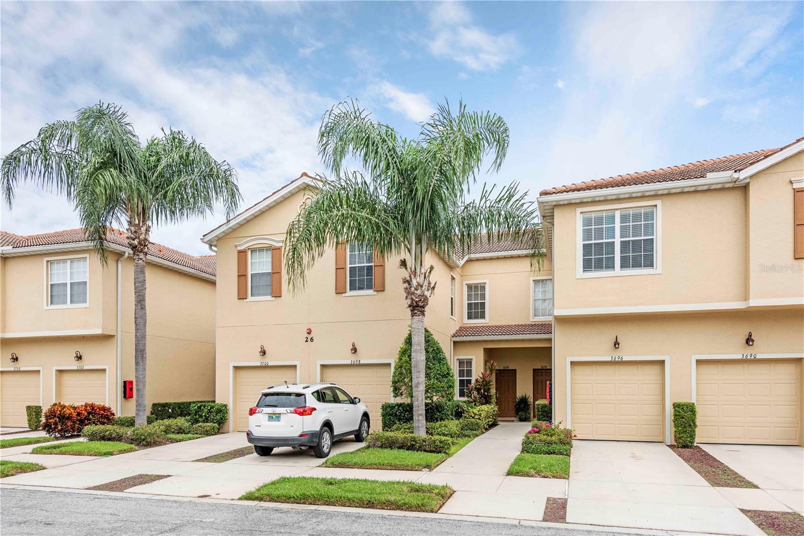 Welcome to the largest unit in Parkridge, a gated community along University Parkway. This two-story townhome features 3 spacious bedrooms, 2 bathrooms, and an additional gaming room, perfect for entertainment or a home office. Tile flooring in the kitchen and main living area. full lake view. New roof installed. One attached garage. Parkridge offers residents access to a community pool and the convenience of being just 5 minutes from the interstate and only a few miles from the UTC Mall. The property is near local dining options and the Lockwood Ridge Cinema Plaza. It is also just minutes from premier shopping, University Park Country Club, Lakewood Ranch, Whole Foods Market, Detwiler's Farm Market, and the vibrant downtown areas of Lakewood Ranch and Sarasota. This pristine, move-in-ready home is the perfect blend of comfort, location, and lifestyle. For real estate investors, property is rented $2,395/ month until end of January 2026.