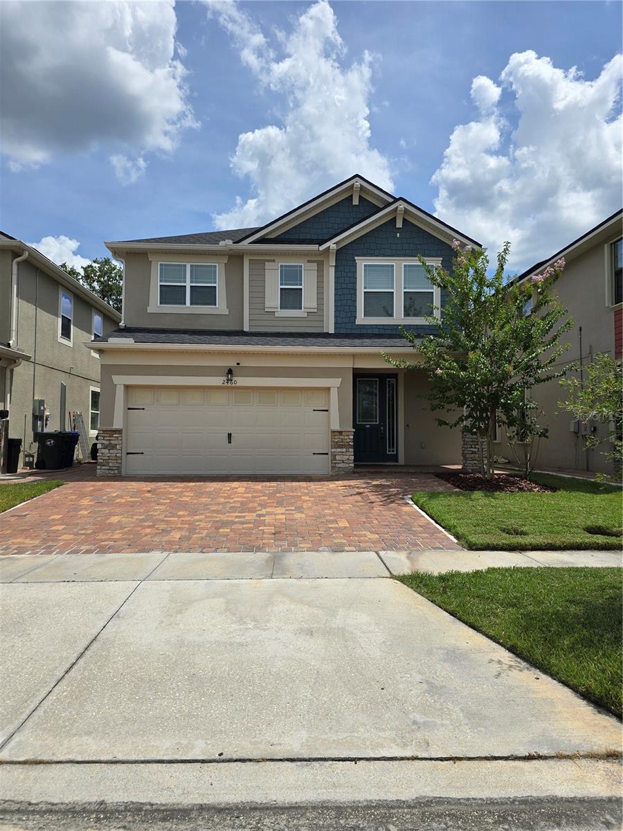 A spacious single-family home in a guard-gated community. Spectacular two-story home with 4 bedrooms, 2.5 bathrooms, and an air-conditioned 2-car garage with a spacious driveway for two more cars. Ceramic tile on the first floor and carpet on the second. Includes: washer, dryer, stove, refrigerator, microwave, dishwasher, and garbage disposal. Summer kitchen on the patio. Both the indoor and outdoor kitchens feature stainless steel appliances, a pantry, and a breakfast bar. Just 10 miles from the Disney area and 2 miles from The Loop Shopping Center. Surrounded by a large commercial area that includes restaurants, gyms, shops, childcare, and a post office. Beautiful community pool, fitness center, and event room. Credit and background checks will be performed upon application.