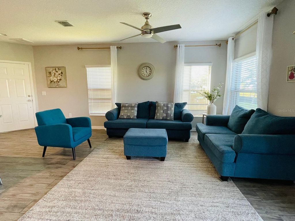 Photo of 1301 Flowing Tide Drive, Orlando, FL 32828 (MLS # O6400859)