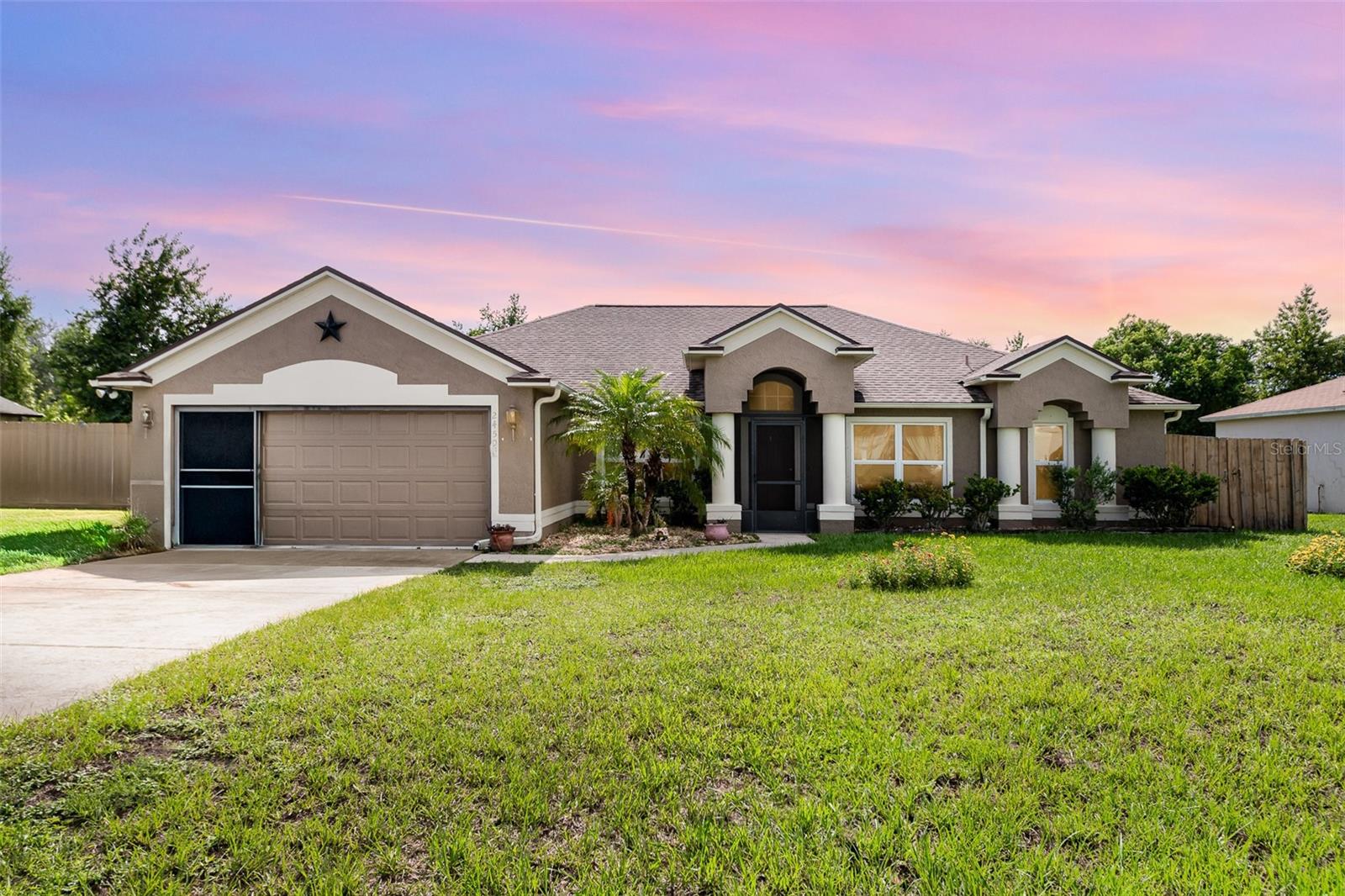 Don’t miss this beautifully maintained and recently updated Mercedes-built Ascot Bay Model (2002), ideally located within walking distance to top-rated schools and the local library. Nestled on a quiet conservation lot with no rear neighbors, this home offers both privacy and convenience — and NO HOA! Step inside to discover a bright, open split-bedroom floor plan designed for comfort and entertaining. Featuring 18” tile flooring throughout the main living areas, wood laminate in all bedrooms, and pendant lighting over the inviting breakfast bar, this home strikes the perfect balance of style and function. Key features include Hurricane-impact windows (2021), newer roof (2019), efficient A/C system, indoor laundry room with full-size front-load stackable washer & dryer and two-car garage with a full sliding screen enclosure. Enjoy peace and tranquility in the expansive 400 sq ft screened-in lanai, perfect for relaxing or entertaining while soaking in views of the serene conservation area. The fully fenced backyard is ideal for pets and outdoor enjoyment. The spacious primary suite offers a true retreat with a jetted tub, a newly remodeled walk-in shower, and dual vanities. Homes like this don’t come around often — especially with no HOA, modern upgrades, and such a prime location. Schedule your private showing today before it’s gone!