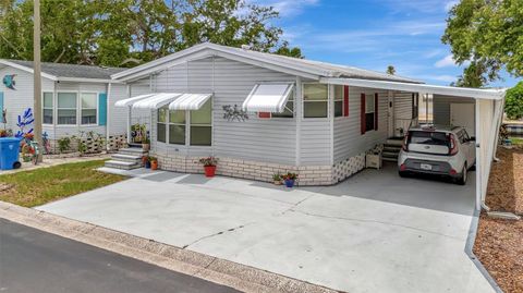 Photo of 106 N Saint George Circle, Apollo Beach, FL 33572 (MLS # TB8468849)