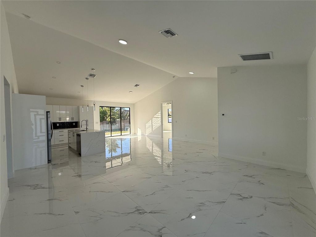 Photo of 2620 NE 22nd Avenue, Cape Coral, FL 33909 (MLS # O6375538)