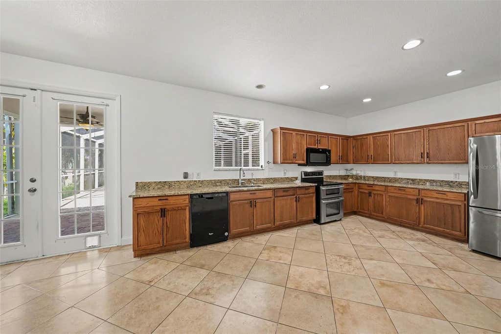 Photo of 2436 Spring Hollow Loop, Wesley Chapel, FL 33544 (MLS # TB8509426)