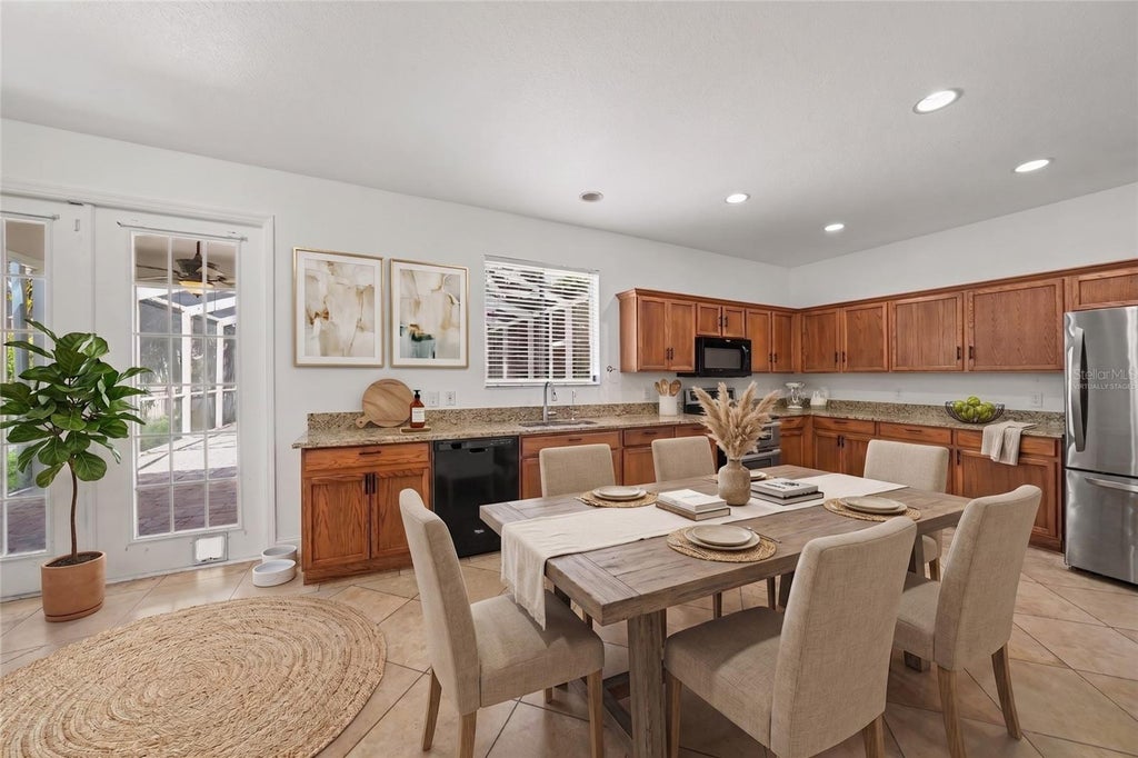 Photo of 2436 Spring Hollow Loop, Wesley Chapel, FL 33544 (MLS # TB8509426)