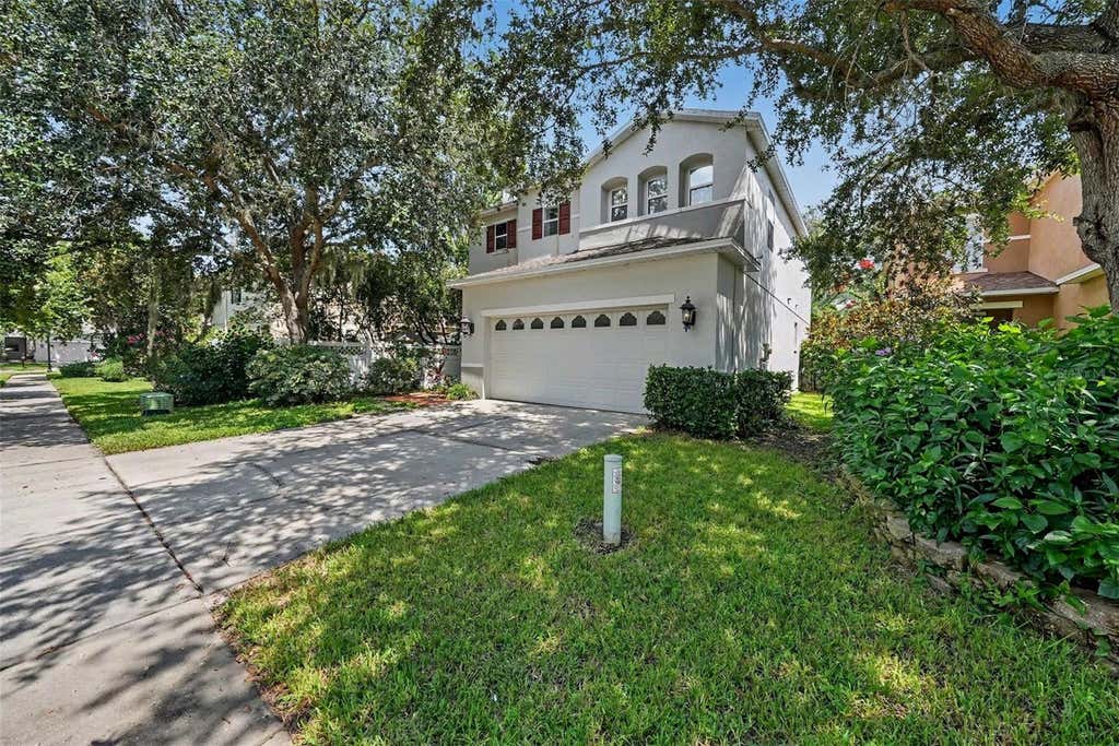 Photo of 2436 Spring Hollow Loop, Wesley Chapel, FL 33544 (MLS # TB8509426)