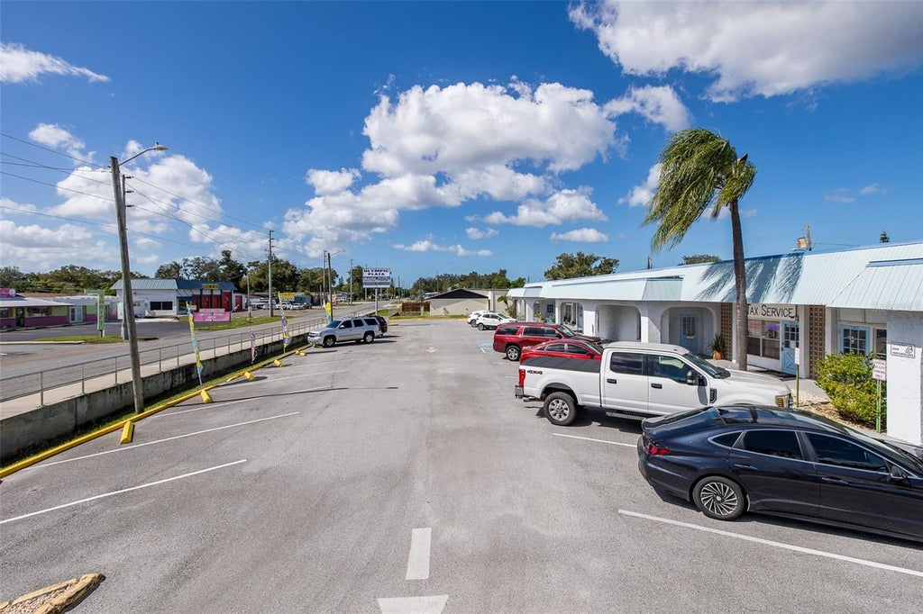 Photo of 5345 Mile Stretch Drive, Holiday, FL 34690 (MLS # W7890559)