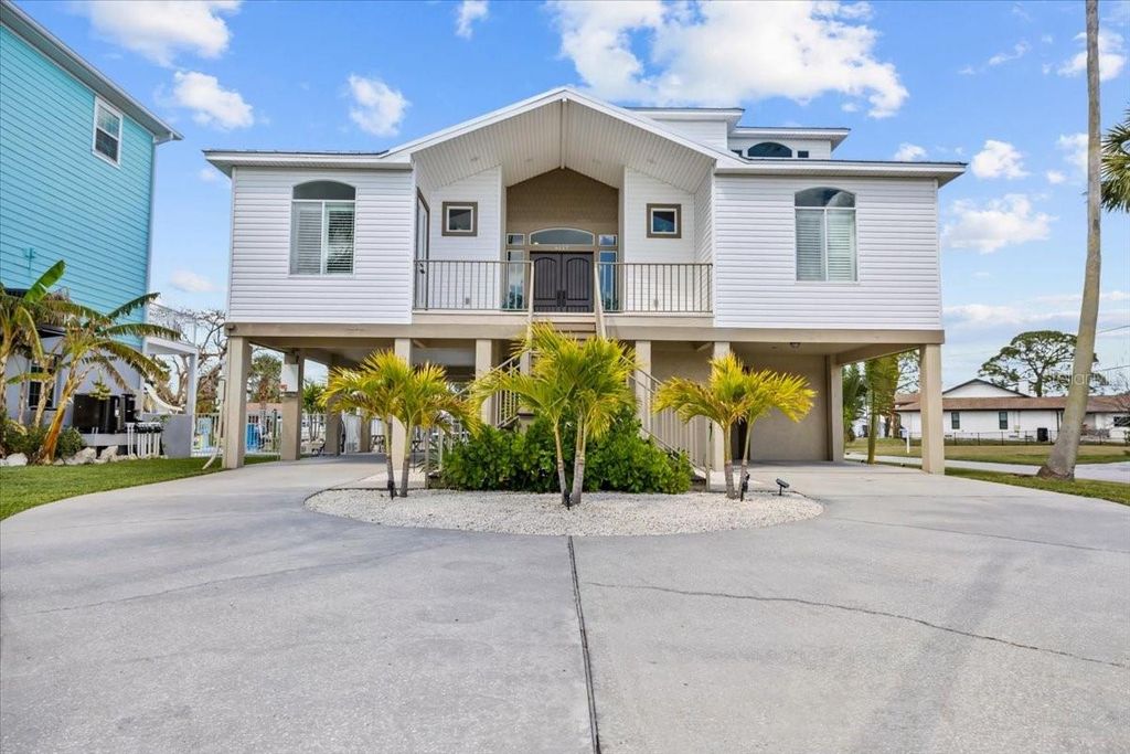 Photo of 8117 Brighton Drive, Port Richey, FL 34668 (MLS # TB8483187)