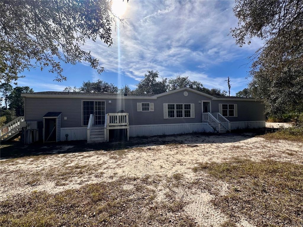 Photo of 4125 Tiger Creek Trl, Lake Wales, FL 33898 (MLS # L4957886)