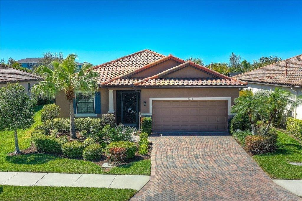 Escape to your own private sanctuary in the heart of Sarasota. This beautifully maintained 3-bedroom, 2-bath home sits against a serene nature preserve, offering total privacy and peaceful views of untouched Florida beauty. Inside, a bright and spacious gathering room creates the perfect setting for entertaining, while the stylish kitchen, complete with builder-upgraded cabinetry, balances both form and function. One of the guest rooms features a queen Murphy bed that remains with the home, adding flexibility for guests or a multi-purpose space. Step outside to the extended lanai, ideal for relaxing or entertaining, with room to add a pool and a built-in gas line that’s ready for your grill. The garage has been thoughtfully extended by two feet on each side, providing ample space for storage, beach gear, or tools. Recent upgrades bring peace of mind, including a new AC in 2024, new appliances in 2023, and a professionally cleaned and sealed roof and driveway with a transferable warranty. Nestled in a quiet yet convenient location just minutes from University Town Center and only a short drive to Lido Beach and downtown Sarasota, this home blends comfort, style, and nature, truly the best of Florida living.
