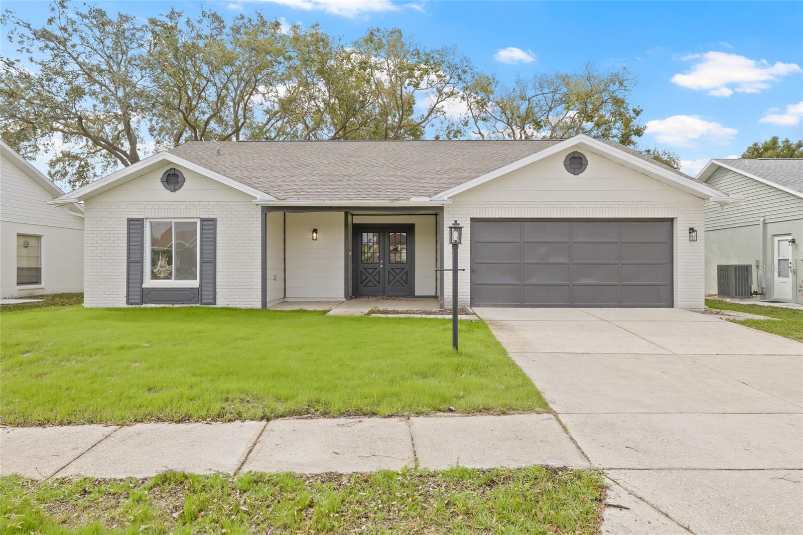 Hey there! Welcome to Heritage Lake, a friendly 55+ neighborhood where it’s easy to feel at home. This 2-bedroom, 2-bath home with a 2-car garage is move-in ready, and the sellers are even offering **buyer incentives** for a quick sale. All the big updates are done! New roof, new A/C, newer windows, and a 2023 water heater-so you can focus on settling in and enjoying life.
Step inside and you’ll notice how open and bright it feels, thanks to oversized windows and tile flooring throughout. The kitchen is a total showstopper with fresh cabinets, stone countertops, brand-new appliances, and a huge island that naturally becomes the gathering spot when friends or family drop by. Both bathrooms have been tastefully updated, and the primary suite gives you plenty of breathing room with a walk-in closet. Out back, the screened-in porch is perfect for morning coffee or an evening wind-down, and new sod with a sprinkler system keeps things looking fresh without much effort.
One of the best things about Heritage Lake is the community itself. There’s always something going on whether it's pool time, pickleball, shuffleboard, bocce, cornhole, clubs, events, you name it making it easy to connect with neighbors and stay engaged. Situated in a prime location, you’re just minutes from shopping, dining, medical facilities, beaches, and top attractions. Don’t miss this fantastic opportunity...it’s the perfect blend of comfort, community, and convenience.