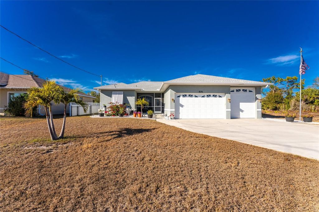 Photo of 515 Boundary Boulevard, Rotonda West, FL 33947 (MLS # D6145950)