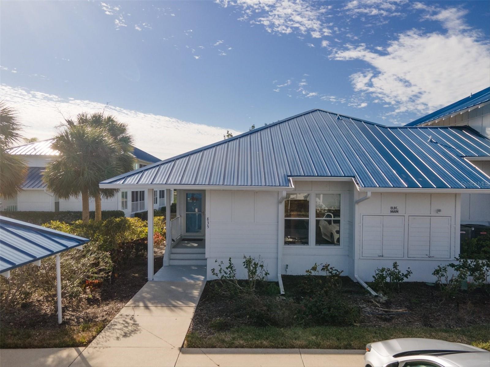 Carefree Coastal Living Just Minutes from the Beach. Furnished First-Floor Home in Perico Bay Club. Discover the ease and relaxation of Florida living in this maintenance free, furnished, first-floor *end unit* with peaceful water views in the highly sought after, guard-gated Perico Bay Club. Designed for those who value comfort, convenience, and a vibrant, resort-like atmosphere, this home is perfect for full-time living or a peaceful getaway retreat.
Enjoy your morning coffee or dining while enjoying water views from the living room, dining area, kitchen, and spacious primary bedroom, every moment here feels like a vacation. You’ll love the open layout with vaulted ceilings and an abundance of natural light. The updated kitchen features brand-new stainless steel appliances and the washer and dryer are conveniently located in a central hallway. The king-size primary suite offers a large walk-in closet and private en-suite bath ensures a perfect place to unwind.
Perico Bay Club Community amenities include a clubhouse with fitness center, heated lap pool, tennis, pickleball and shuffleboard courts,
Kayak storage and launch. This is a great neighborhood for dog walking, bike riding and leisurely strolls. Just minutes from the sugar sand beaches of Anna Maria Island and close to shops, dining, and nature preserves, Perico Bay Club offers the best of both worlds: beachside charm and everyday convenience in a secure, low-maintenance setting. If you're ready for a simpler, more enjoyable lifestyle near the gulf, this is the perfect place to call home. Come see it today.