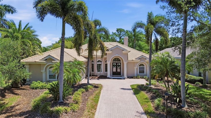 Tucked within Grosvenor Gardens in University Park Country Club, one of Sarasota’s most sought-after golf course communities, this pristine 3-bedroom, 3-bath residence featuring a dedicated den lives like a model home.

Bright, polished, and beautifully maintained, the home offers an elevated sense of ease with double front doors, abundant natural light, soaring ceilings, crown molding, built-in surround sound, and thoughtful upgrades throughout. Recent improvements include all-new appliances, a tankless water heater, and both AC units replaced.

Designed to embrace indoor-outdoor living, nearly every room opens to the lanai, creating a seamless flow throughout. The den is perfectly positioned with sliding glass doors and a beautiful view of the pool, offering a flexible space for working, relaxing, or hosting. The dining room features impact glass windows, adding both style and peace of mind.

The primary suite includes dual closets with custom built-ins, while the split garage offers fresh epoxy flooring and a rare, air-conditioned third bay ideal for a golf cart or additional storage.

Outside, the setting feels incredibly private. The heated pool and spa are surrounded by a travertine deck, with an outdoor fireplace creating a quiet, resort-style atmosphere for both everyday living and entertaining. Electronic hurricane shutters on the lanai add both convenience and peace of mind, while owned solar panels help keep electric costs impressively low.

University Park Country Club is widely recognized among Florida’s top golf communities, offering 27 holes of championship golf along with tennis, pickleball, a fitness center, croquet, and a full calendar of social events. Residents also enjoy on-site dining through a social membership, all in a prime location just minutes to I-75, downtown Sarasota, University Town Center, and the area’s renowned Gulf Coast beaches.

This is the kind of home that feels refined, private, and effortlessly livable, the kind you walk into and immediately know it’s the one.