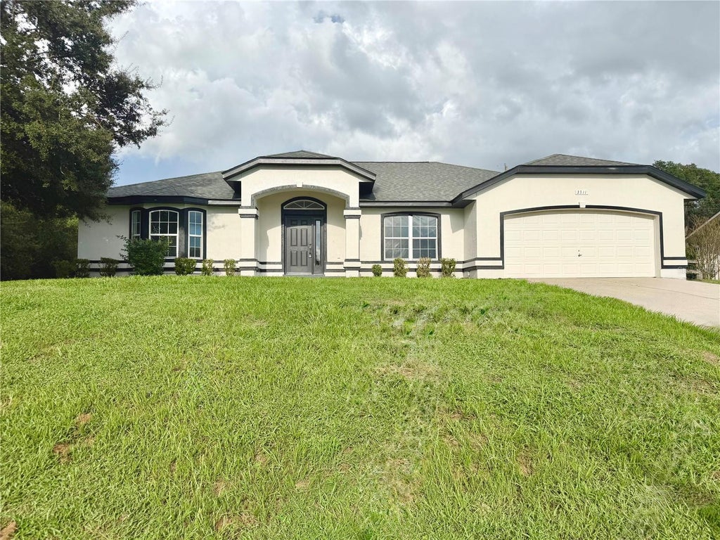Photo of 3311 SW 133rd Place, Ocala, FL 34473 (MLS # R4911943)