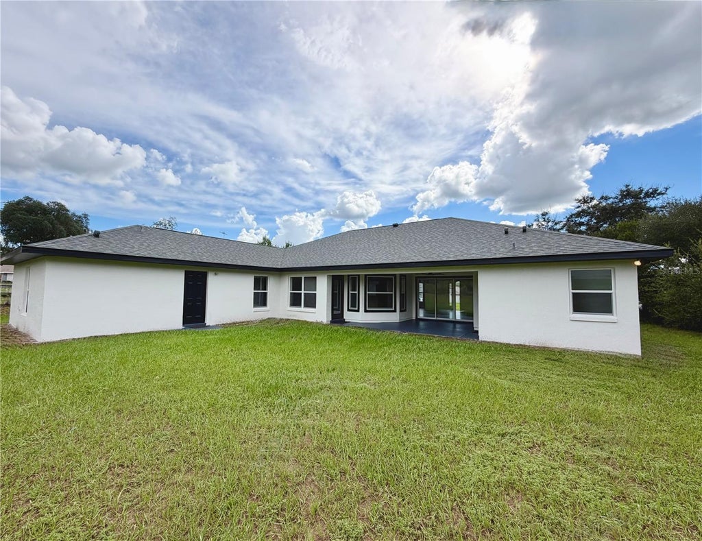 Photo of 3311 SW 133rd Place, Ocala, FL 34473 (MLS # R4911943)