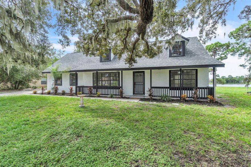 Welcome to this beautifully renovated two-story pool home located at 2501 India Blvd, Deltona, FL. This spacious 3-bedroom, 2-bath residence combines modern finishes with timeless charm, offering over 2,300 square feet of living space on a large lot with water views.

Step inside to discover a bright open floor plan featuring luxury vinyl plank flooring, recessed lighting, and large picture windows that fill the home with natural light. The designer kitchen boasts brand-new stainless steel appliances, quartz countertops, a center island, and stylish backsplash—perfect for entertaining or family gatherings.

The first floor offers expansive living and dining areas along with a guest suite or office. Upstairs, the spacious primary suite features a walk-in closet and a beautifully tiled en-suite bathroom. Each additional bedroom is generously sized with updated fixtures and finishes throughout.

Outside, enjoy your private screen-enclosed pool area with plenty of deck space—ideal for relaxing or hosting weekend get-togethers. The oversized three-car garage and long driveway provide ample parking. Situated across from scenic lakefront views, this home perfectly blends comfort, space, and lifestyle.

Conveniently located near I-4, top-rated schools, shopping, and dining, this home is just minutes from Wekiva Springs, Orlando, and Daytona Beach.