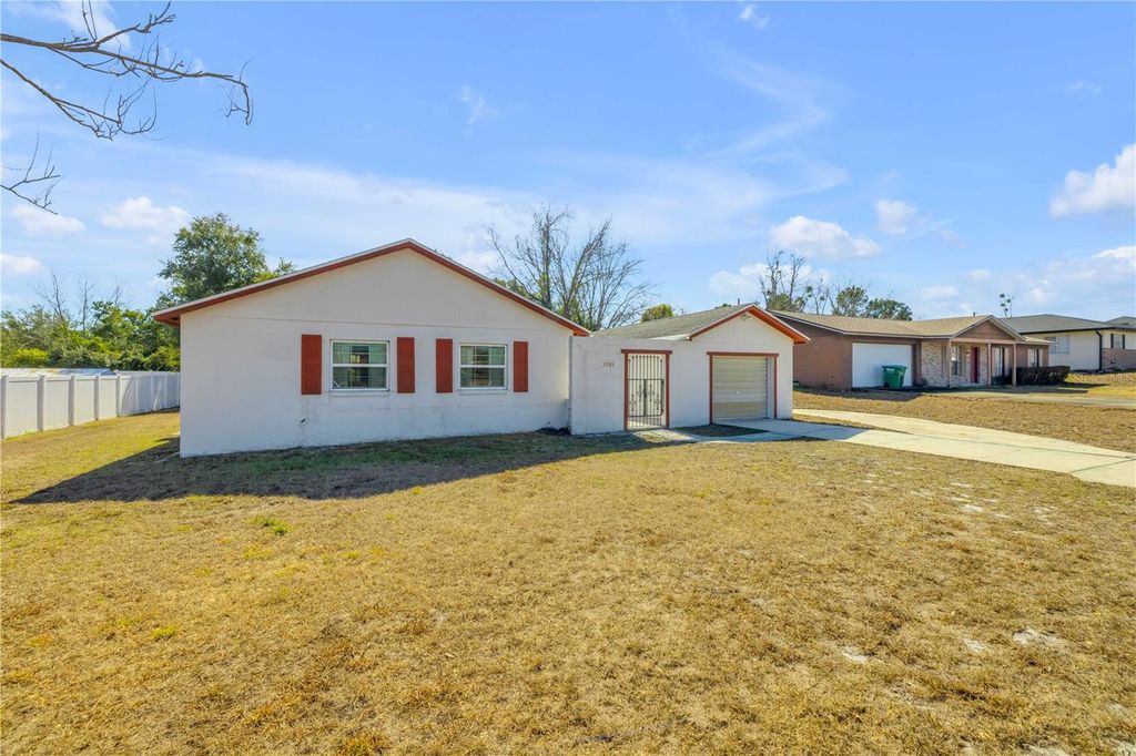 Photo of 1981 S Merrick Drive, Deltona, FL 32738 (MLS # O6381519)